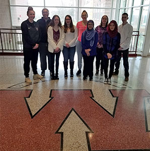 group picture of Top 10 students standing near the W in the main lobby at Watervliet High School