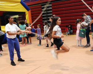 Student jumps rope in Double Dutch demonstration