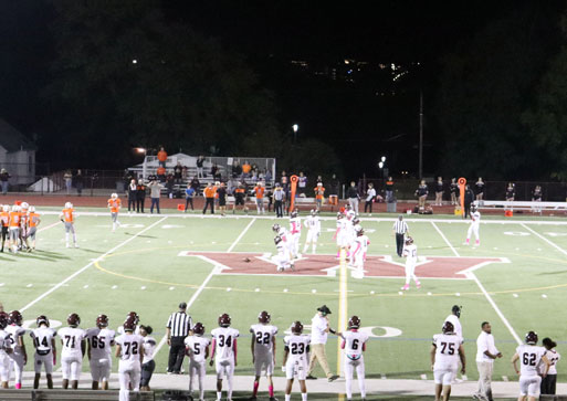 A view of the field on game night from the top of the bleachers