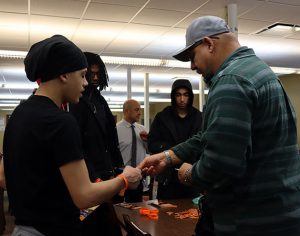 Labor union rep speaks with students in the library