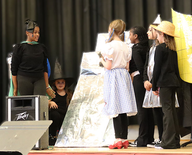 Members of Drama Club perform a scene from the Wizard of Oz