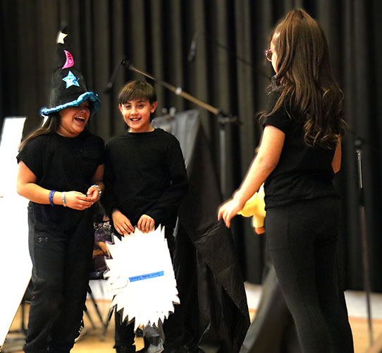 Members of Drama Club perform a scene from Rapunzel