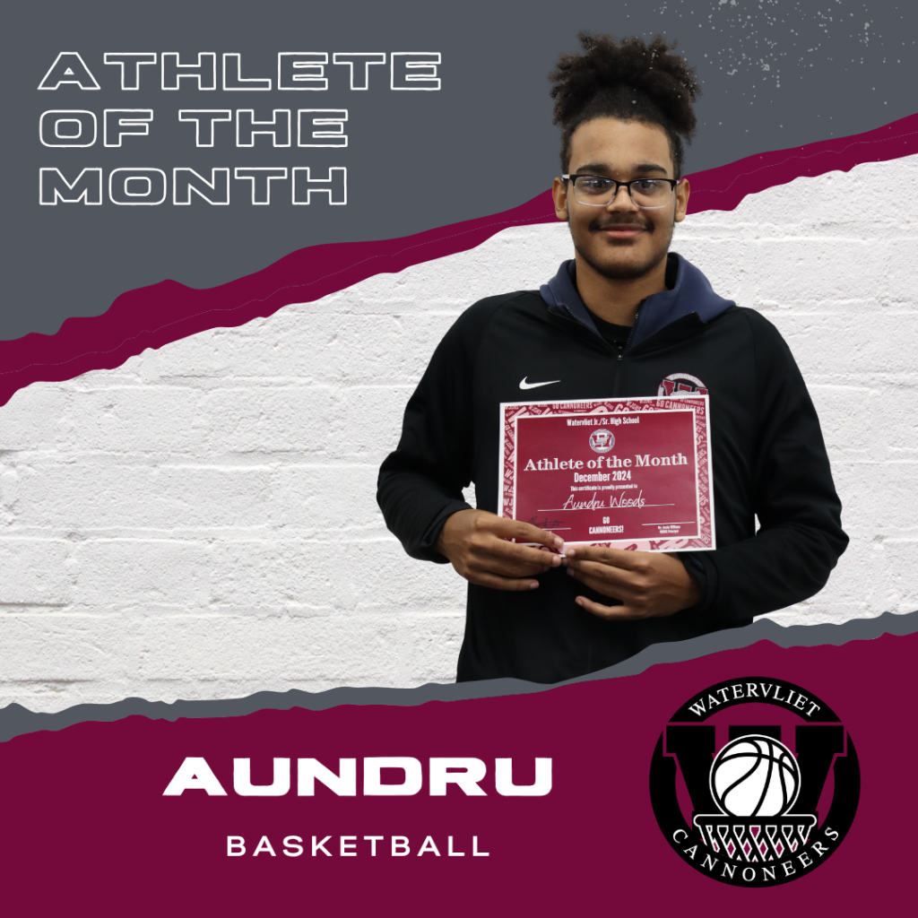 Basketball student athlete of the month for December holds a certificate